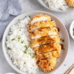 Air Fryer Chicken Katsu with Homemade Katsu Curry Sauce 24 Crispy air fryer chicken katsu sliced and served over steamed rice with homemade katsu curry sauce drizzled on top