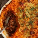 The Best Beef and Lentil Cottage Pie 21 Beef and lentil cottage pie fresh from the oven with golden kumara mash topping in a large baking dish