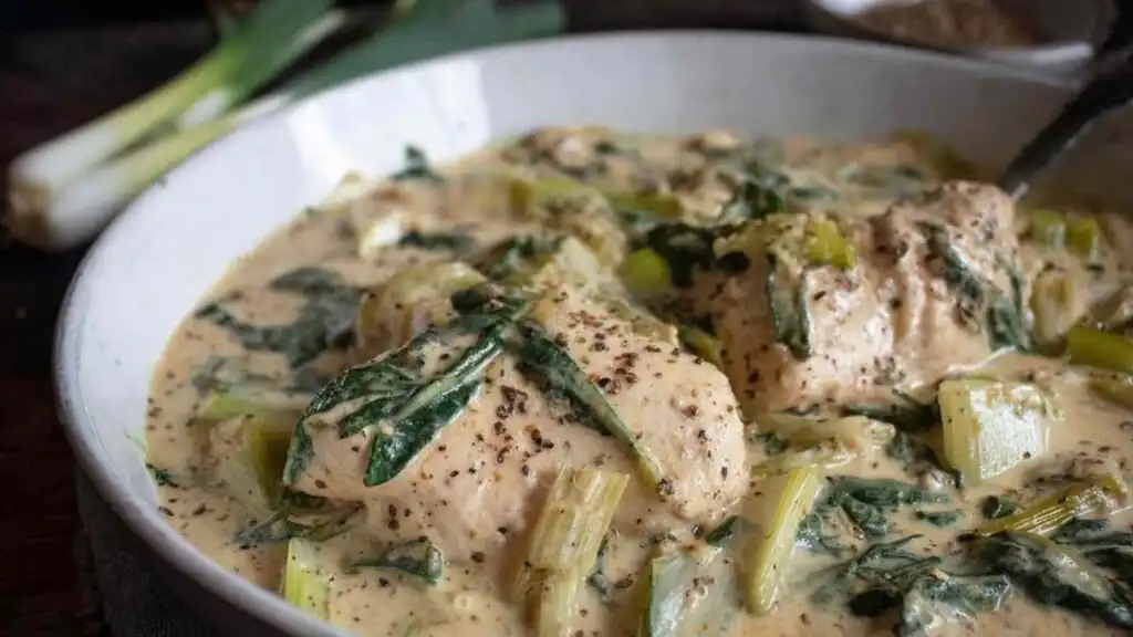 Chicken and Leeks Recipe 10 Creamy chicken and leeks recipe served in a large skillet with mustard broth and fresh tarragon