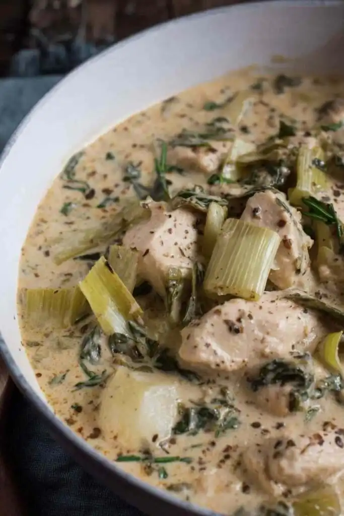 Chicken and Leeks Recipe 11 Creamy chicken and leeks recipe served in a large skillet with mustard broth and fresh tarragon