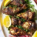 High protein sumac chicken air fryer recipe served on a plate with basmati rice and fresh herbs