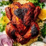 High Protein Whole Oven Roasted Tandoori Chicken 6 High protein whole oven roasted tandoori chicken on a rack showing deep red charred crust fresh from the oven