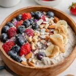 Protein-Packed Overnight Oats With Protein Powder 15 Protein-packed overnight oats with protein powder in a mason jar topped with fresh blueberries and a drizzle of almond butter
