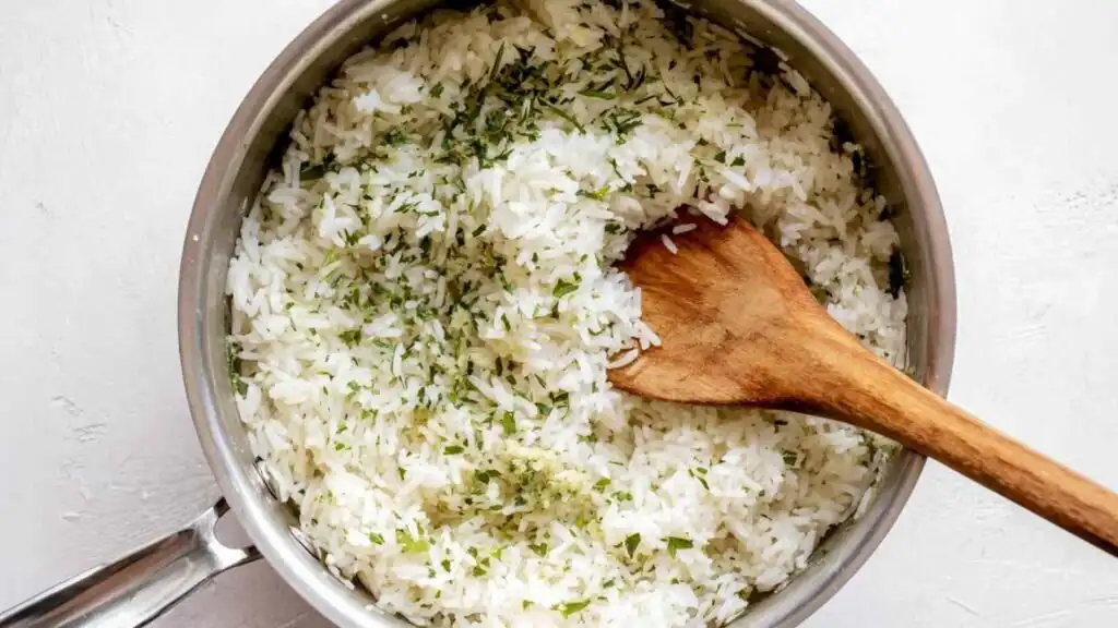 Cilantro Lime Chicken and Rice Bowls with Spicy Green Goddess Dressing 16 Jasmine rice cooking in full fat coconut milk in a covered pot for cilantro lime chicken and rice bowls