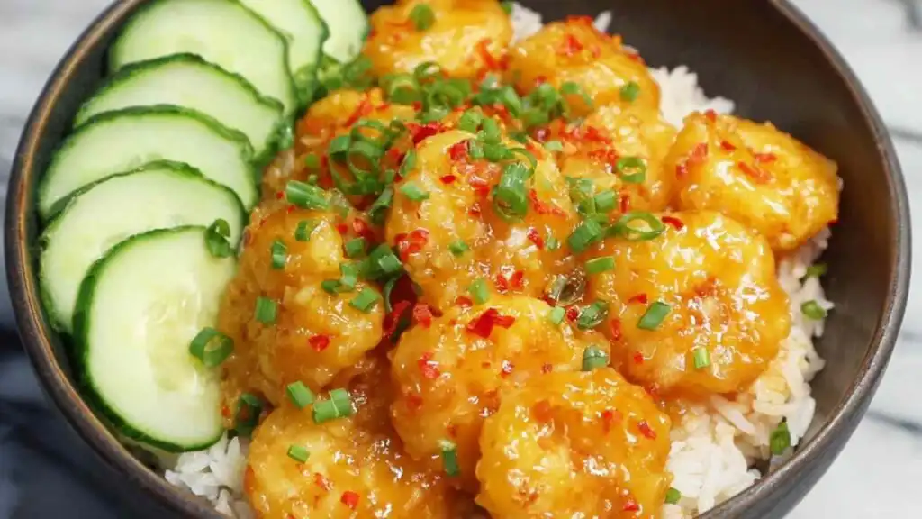 Bang Bang Shrimp 19 Crispy bang bang shrimp tossed in creamy sweet and spicy sauce served over steamed white rice with scallions