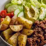 High Protein Burger Bowls 12 High protein burger bowls with seasoned ground beef, crispy potatoes, fresh vegetables and creamy cottage cheese burger sauce